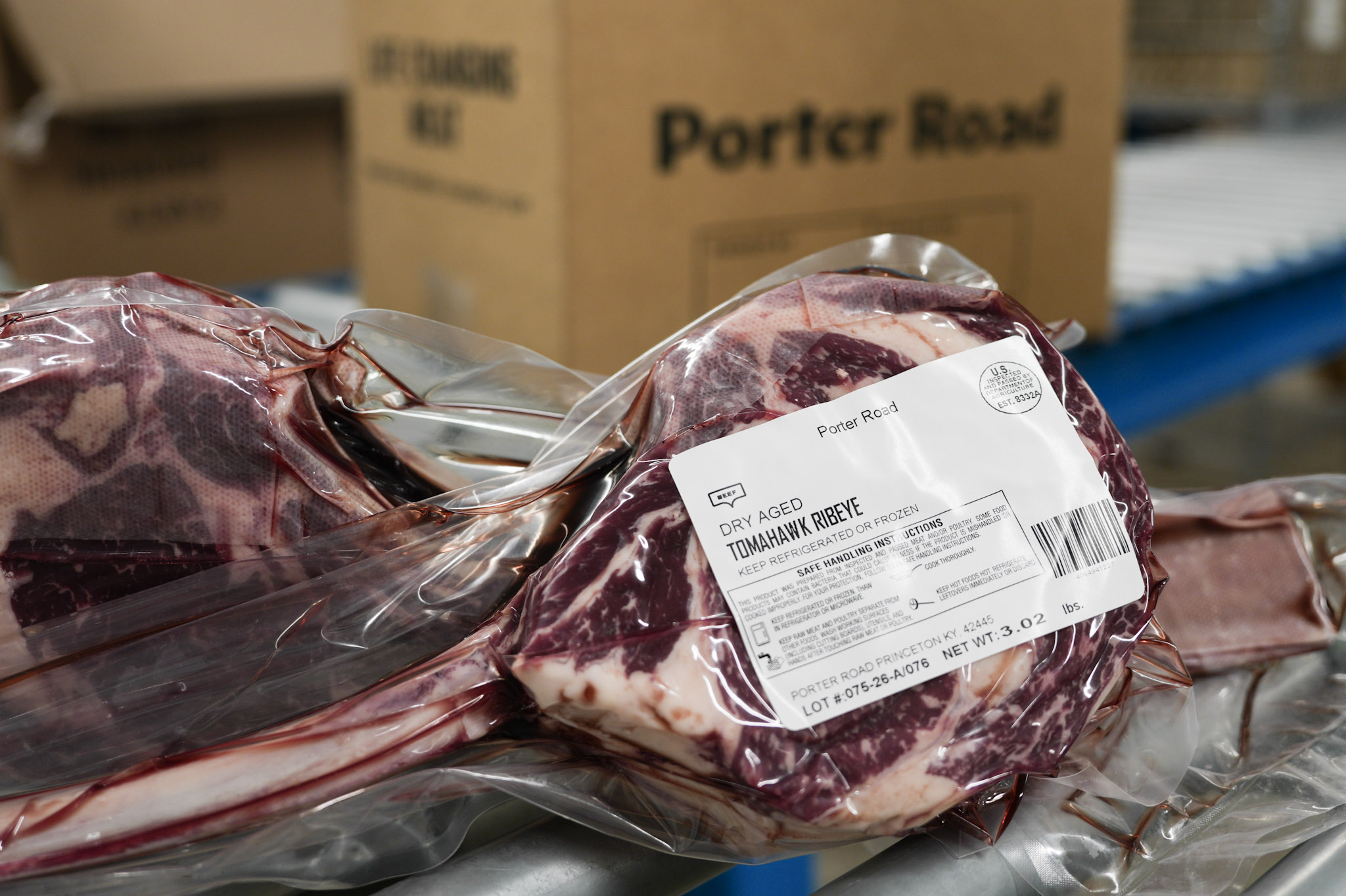 Dry-aged tomahawk ribeye in Porter Road packaging — product of the Princeton facility